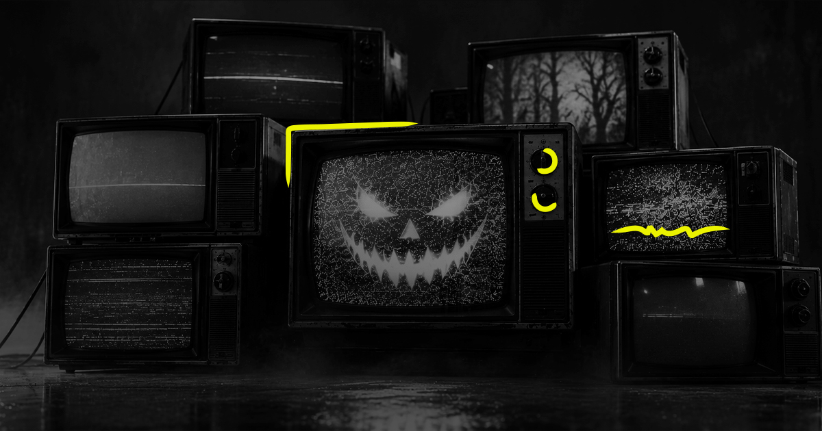 black and white televisions with spooky halloween imagery