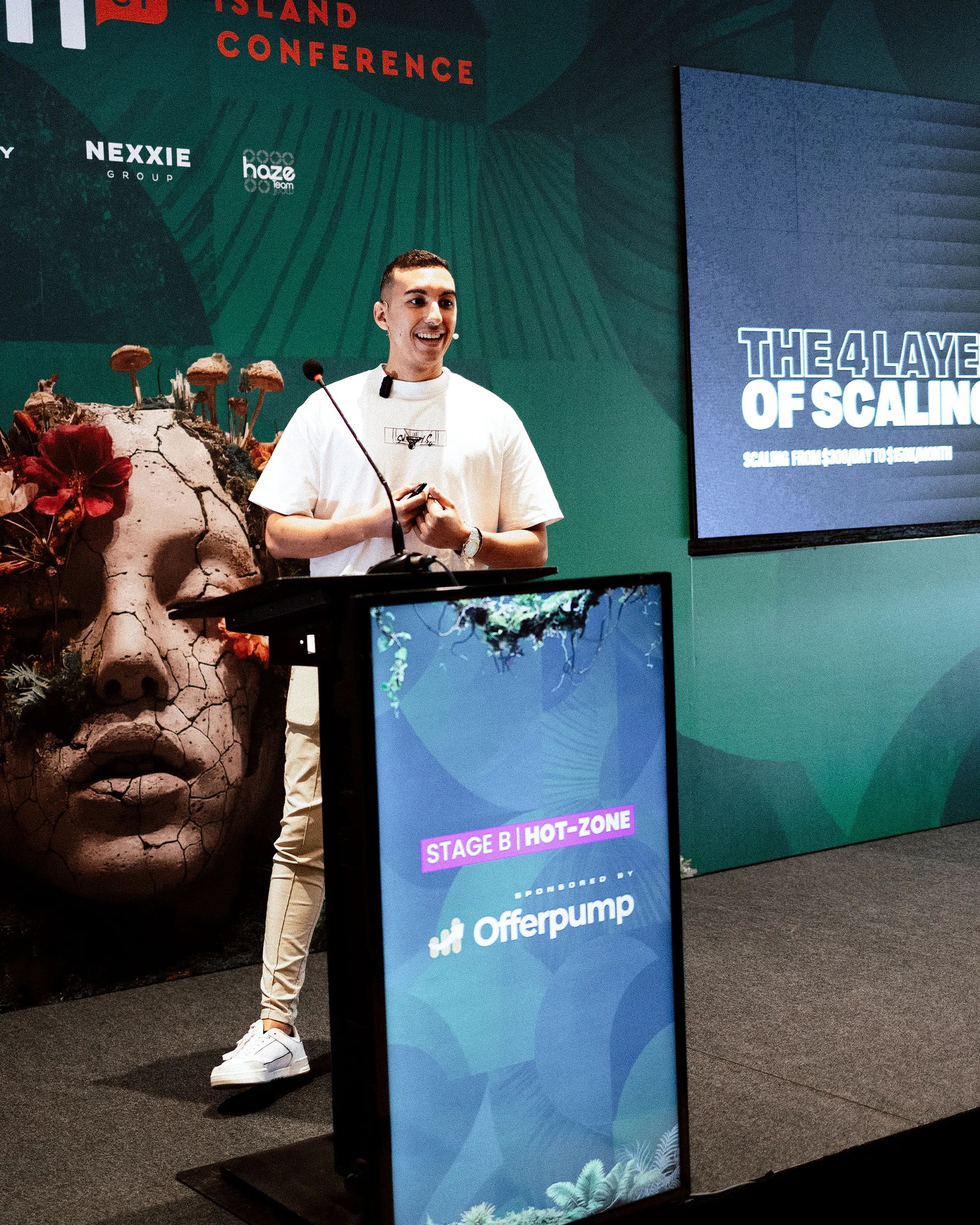 Marouan giving a talk at iCon 2026 on the Hot Zone stage