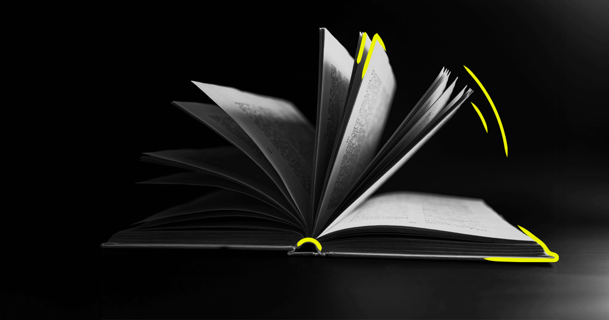 black and white image of a book turning