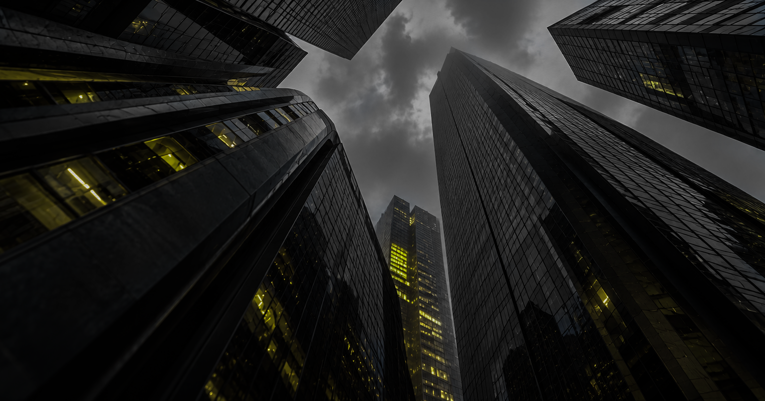 Black, grey and yellow image of skyscrapers rising into the sky